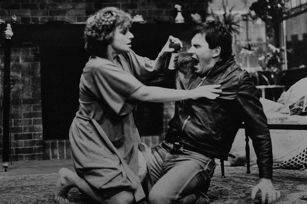Production still for "Extremities". L-R: Linden Wilkinson as Marjorie, Nicholas Eadie as Raul. Photographer: David B. Simmonds