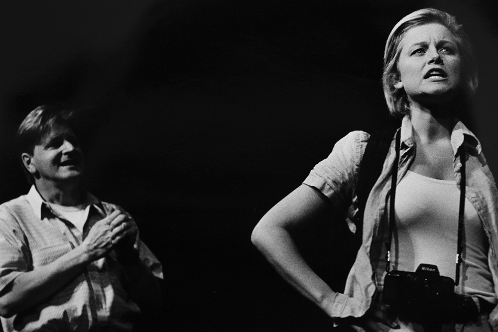 Production still for "Rising Fish Prayer". L-R: Robert Grubb as Ken Paterson, Sophie Heathcote as Petra Dankou. Photographer: Jeff Busby