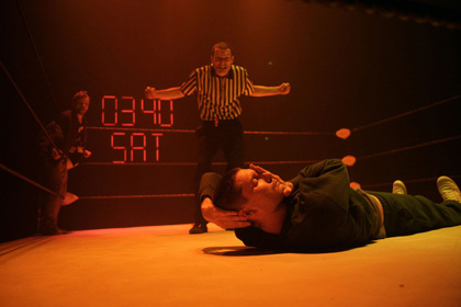 Production still for "Headlock". L-R: Gerard van Dyck, Luke Hockley, Byron Perry. Photographer: Jeff Busby