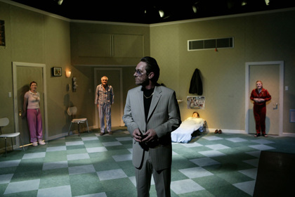 Production still for "The Metamorphosis". L-R: Mandy McElhinney, Tony Llewellyn-Jones, Kim Gyngell, Matthew Whittet (in bed), Julie Forsyth. Photographer: Jeff Busby