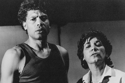 Production still for "State of Shock". Ernie Dingo, Lynette Narkle. Photographer: Unknown