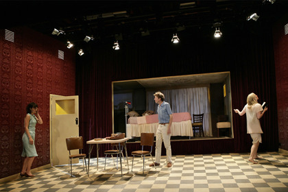 Production still for "Furious Mattress". L-R: Rita Kalnejais as Anna, Robert Menzies as Pierce, Kate Kendall as Else. Photographer: Jeff Busby