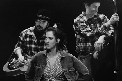 Production still for "King of Country". L-R: Gerry Hale (musician), Carrie Barr as Vikki, Paul Gadsby (musician). Photographer: Jeff Busby