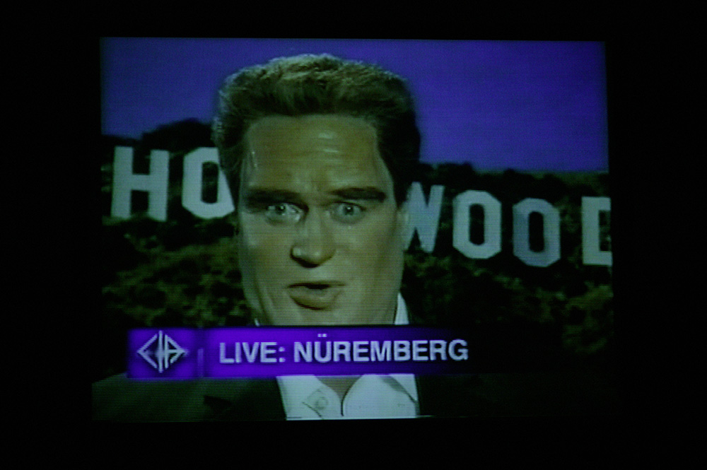 Production still for "The Big Con". Max Gillies as Arnold Schwarzenegger. Photographer: Lisa Tomasetti