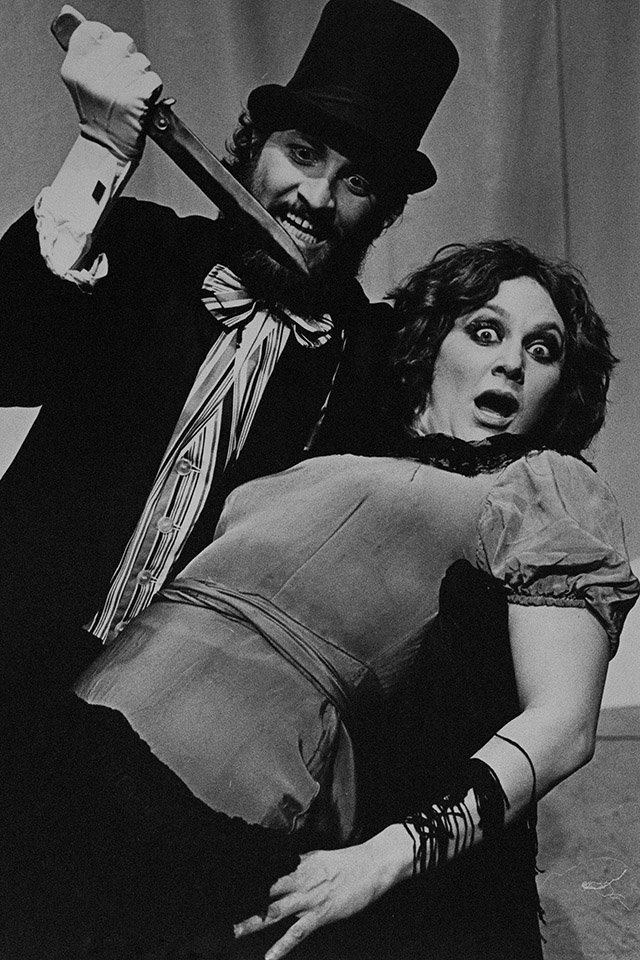 Production still for "The Ripper Show". L-R: John Paramor as Charlie Sharpe, Deidre Rubenstein as Jane Sharpe. Photographer: Jeff Busby