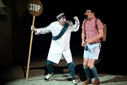 Production still for previous Adelaide season of "Pinocchio". L-R: Geoff Revell as Stromboli, Nathan O'Keefe as Pinocchio. Photographer: Brett Boardman