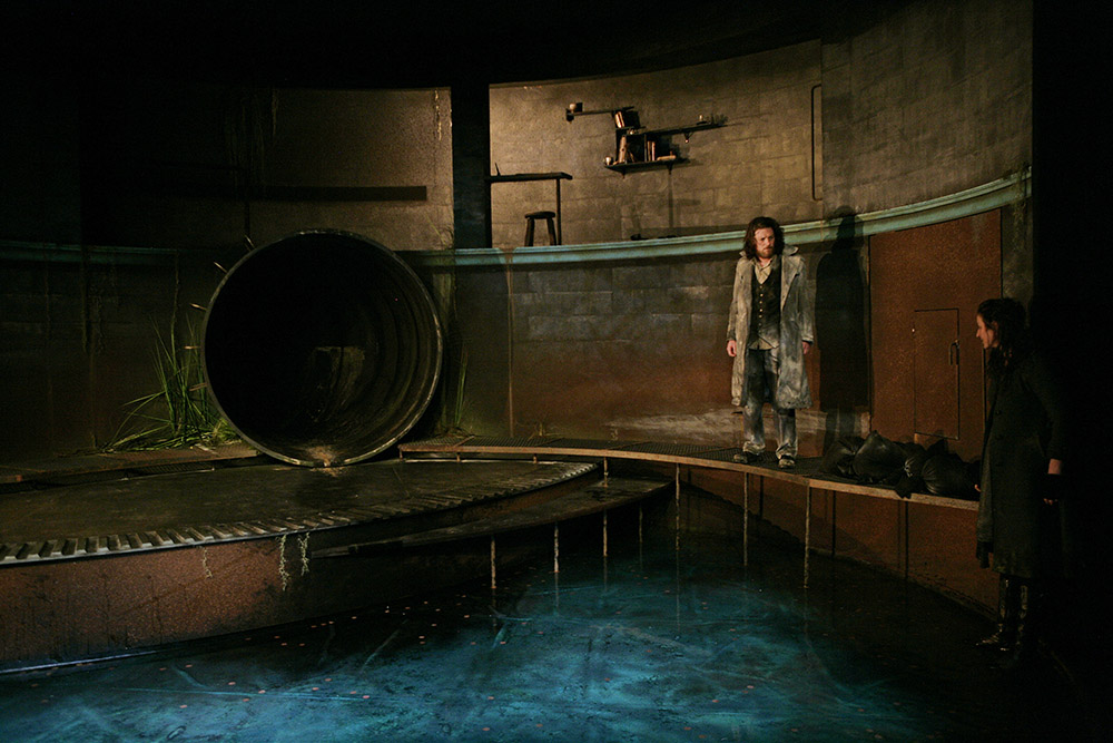 Production still for "Knives in Hens". L-R: Dan Spielman as Gilbert Horn, Kate Box as the Young Woman. Photographer: Jeff Busby