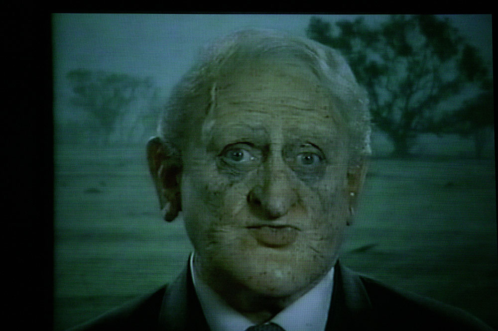 Production still for "The Big Con". Max Gillies as Philip Ruddock. Photographer: Lisa Tomasetti