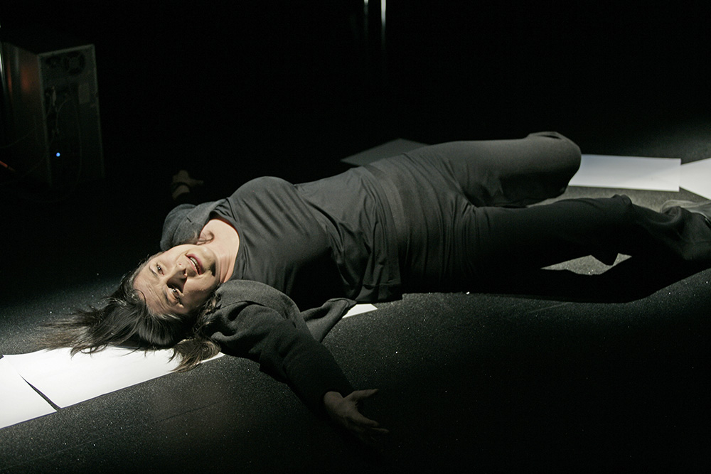 Production still for "Womanbomb". Pamela Rabe as The Woman. Photographer: Lisa Tomasetti