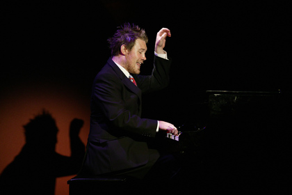 Production still for "The Big Con". Eddie Perfect. Photographer: Lisa Tomasetti