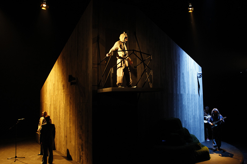 Production still for "The Dragon". Simon Hall (centre). Photographer: Jeff Busby