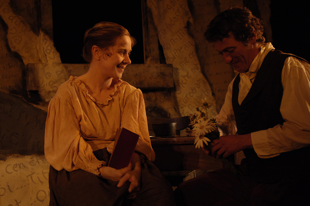 Production still for Adelaide production of "Translations". L-R: Michaela Cantwell as Sarah, Rory Walker as Manus. Photographer: Nick Hopton