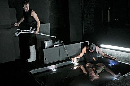 Production still for "A View of Concrete". L-R: Richard Pyros, Peter Houghton. Photographer: Jeff Busby