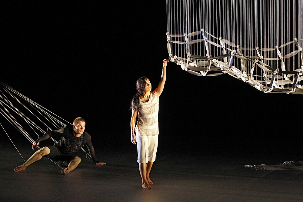 Production still for "Connected". L-R: Alisdair Macindoe, Marnie Palomares. Photographer: Jeff Busby